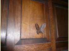 Medieval style oak panelling with raised butterfly